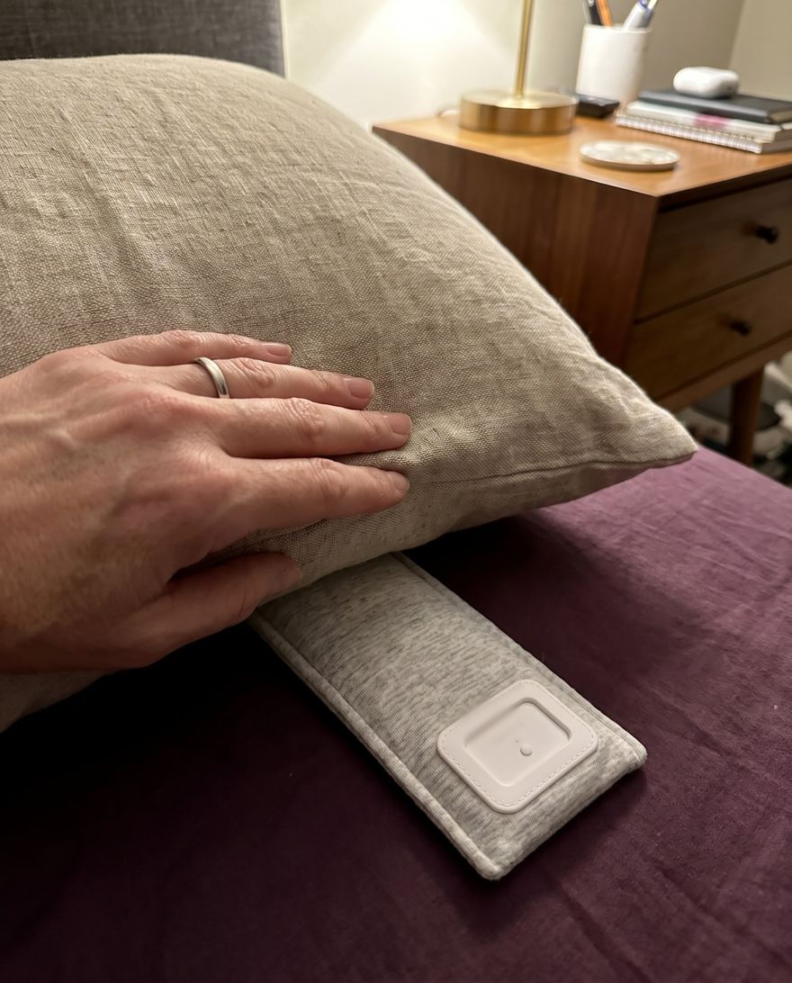 Drowsie in its sleeve, under a pillow